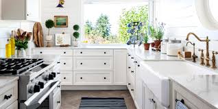 Find out how to remove grease from wood kitchen cabinets without damaging or drying out the wood. How To Clean Kitchen Cabinets Including Those Tough Grease Stains Better Homes Gardens