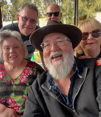 Who'll stop the rain? No one! Everyone was undercover, unless you were  sweaty enough to cool down in the rain! There was music, more music,  friends, family, fun and even cake. Doesn't