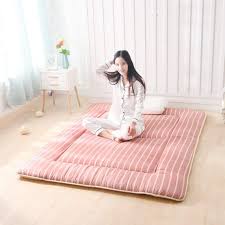 Accent the arms of the futon frame with soft pillows for even more comfortable seating. Pin On Traditional Japanese Bedroom Ideas