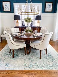 Blue flamestitch wallcovering above a 7 feet high wainscoting blends with leather side chairs and blue velvet captain's chairs. Thanksgiving Tablescape Ideas Southern Hospitality