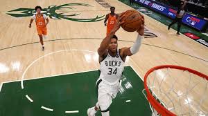 — khris middleton scored 22 points, jrue holiday added 19 points and 12 assists and the milwaukee bucks moved a win from a berth in the. Luppwyvpfcalmm