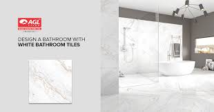 A few minimal flower arrangements provide a welcoming organic touch. White Bathroom Tiles For Designing Your Bathroom Agl Tiles