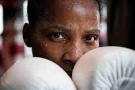 This 42-year-old boxer has a job at IHOP, two kids and 11 titles. She isn't  finished — yet.