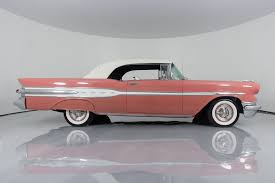 Image result for Carib Coral 1957 Pontiac