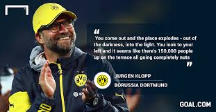 Borussia dortmund stars salute yellow wall following schalke victory despite it being empty with no fans in attendance. How The Yellow Wall Became One Of European Football S Most Spectacular Sights Goal Com