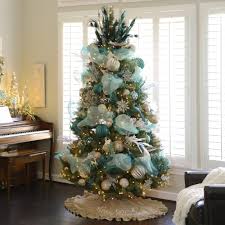 Step Into A Winter Wonderland With This Glitz Glam Tree Decorated Entirely In Kirkland Teal Christmas Turquoise Christmas Christmas Tree Decorations Ribbon