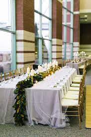Our Wedding Magnolia Leaf Garland Table Runner Gray Table Candles Gold The Nyquists Magnolia Leaves Wedding Magnolia Wedding Wedding Table Flowers