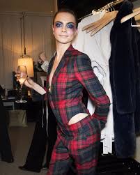 cara delevingne in custom burberry tartan tailoring ahead of her party in london cara delevingne cara delevingne style cara delevigne