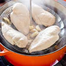 Feed some poached chicken breast to a hungry little one when they need a snack. Perfect Poached Chicken Breasts Cook S Illustrated