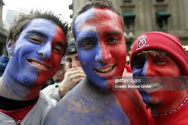 Red Sox fans Derek Sklar, Jordan Gunzy, and Aaron Beers painted their...  News Photo