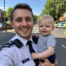 Police Officer Single Dad Celebrates Son's First Birthday