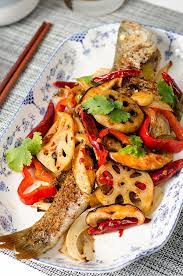 The Fish Is Roasted Until Moist And Tender With A Crispy Surface The Accompanying Vegetables Are Cooked In Szechuan Ho Roast Fish Chinese Fish Recipe Recipes