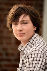 Can my son's hair be fixed in this senior picture?