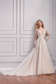 To be the most beautiful bride is a dream of every woman. Martin Thornburg 221203 Blaye 3d Lace Open Back Wedding Dress