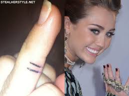 Billy ray cyrus (miley's father) was the first one to get this tattoo inked in 2008. Miley Cyrus Tattoos Meanings Steal Her Style