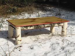 Combining the feel of a farmhouse essential with rivet details that look right at home in an industrial loft, this coffee table is a functional and fashionable addition to your seating group. White Birch Coffee Table This Is One Of A Pair Of Large Co Flickr