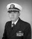 Commander (CDR) Sidney L. Holmes Jr., USN (covered)
