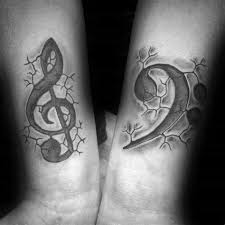 She got the tattoo in australia while she was in the country to perform at the universal music showcase on may 31, 2006. Bass Clef Tattoo Designs Shefalitayal