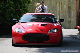 Image result for Magma Red 2011 Aston Martin