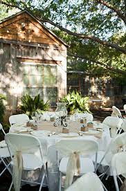 Simple decorations can turn basic white folding chairs into the perfect seating for your rustic chic wedding. Can Plastic Folding Chairs Look Elegant For My Event Ctc Event Furniture Ctc Event Furniture