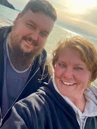 Lake Michigan rock hunter sinks in sand, rescued by firefighters