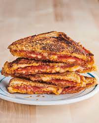 This Sandwich Combines The Best Of A Panini Grilled Cheese And Pizza Recipe Sandwiches Mountain Pies Pizza Sandwich