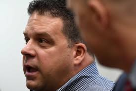 Troy cop charged with assaulting man at Little League game