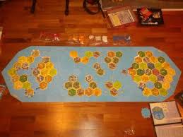 Catan A Combination Of Settlers Seafarers Cities And Knights The Great River And Explorers And Pirates Catan Catan Board Game Board Games