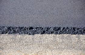 Resurfacing your driveway with asphalt involves performing minor repairs and applying a new layer on the top. What To Do With Standing Water In A Driveway Enright