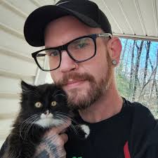 three weeks with my little buddy rocky. I found him a few feet from my  front door at the base of an oak tree being batted around by the  neighborhood cat. the