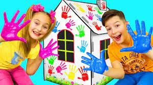 Sasha and Max painting Cardboard Playhouses - YouTube