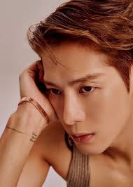 ELLE December 2025 spotlights the standout pieces chosen by Jackson Wang  for this month's hot fashion editorial for ELLE Thailand. From statement  accessories from the iconic LOVE Unlimited collection. Defined by bold