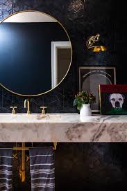20 Ways To Style An Oversized Gold Round Wall Mirror Round Mirror Bathroom Bathroom Decor Large Round Wall Mirror