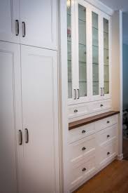 White Or Wood What S The Most Timeless Choice For Kitchen Cabinets Timeless Kitchen Cabinets Glass Kitchen Cabinets Cabinet