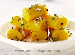 How To Make Khandvi Soft Melt In The Mouth Savoury Gram Flour And Yogurt Pin Wheel Rolls With A Delicious Tempering Indian Food Recipes Food Recipes