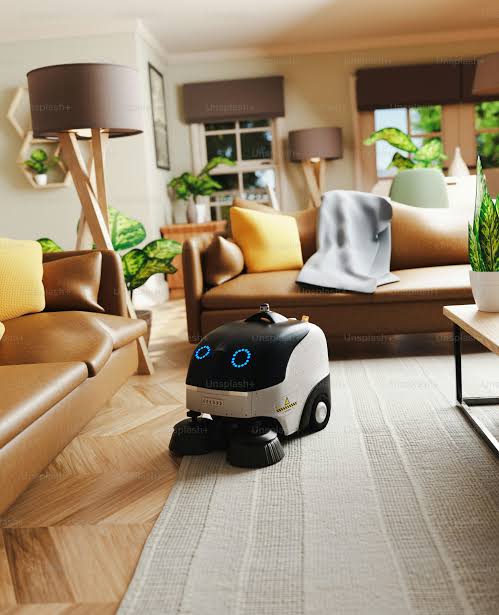 Aspiradora robot limpiando el piso de una sala de estar