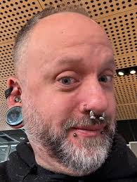 What do you call this piercing ? The technical name is philtrum piercing .  Pierced by @kkwallace