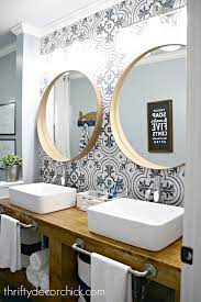 Cultured marble, granite and solid surface resin are materials options available in bathroom vanity backsplashes. The Bathroom Renovation Is Done And Amazing From Thrifty Decor Chick