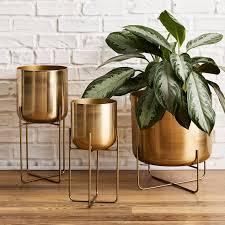See our ideas on how to display indoor plants decor. Spun Metal Standing Planter Brass