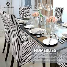 While zebra print makes a strong statement on its own, you can pair it with a bold color to give your dining room added dimension. Zebra Print Chair Covers Off 61