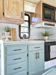 Mix a 50/50 solution of vinegar and warm water and pour it into a spray bottle. Diy Farmhouse Look Bleached And White Washed Oak Cabinets