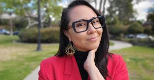 Jenn is wearing captivating frames by Vontélle Eyewear