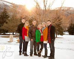 What To Wear For A Family Photo Winter Family Photos Family Photo Pose Winter Family