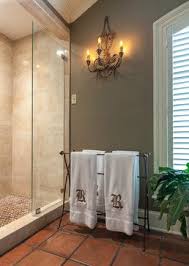 A Lot Of Experts Recommend Grey Colors For The Walls Floors And Furniture Of The Bathroom It D Terracotta Tiles Bathroom Bathroom Tile Designs Tile Bathroom