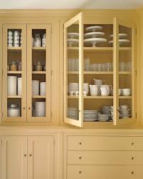 Organize Your Kitchen Cabinets In Nine Easy Steps In 2020 Kitchen Style Yellow Cupboards Crockery Cabinet