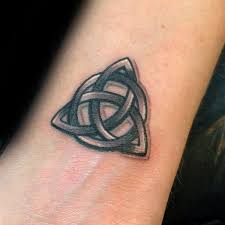 Distinct in a simple way, the celtic knot gives the ideal celtic neck tattoo for men. Small Guys Shaded Wrist Tattoo With Triquetra Design Tattoo Designs Men Celtic Knot Tattoo Irish Knot Tattoo