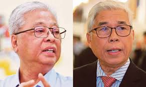 Hassan Karim bela Ismail Sabri, jawab tohmahan Andrew Peris