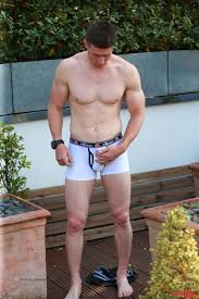 Uncut muscle lad Harry Malinnder really likes showing off his cock -  BuddyBate