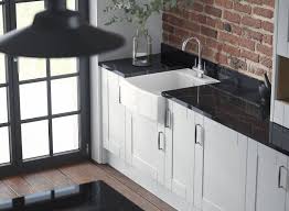 Traditionally, shaker style kitchens have incorporated local timbers in the joinery. Shaker Kitchen In Super White Wren Kitchens