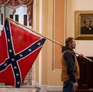 january 6 2021 democrat carrying confederate flag from www.washingtonpost.com